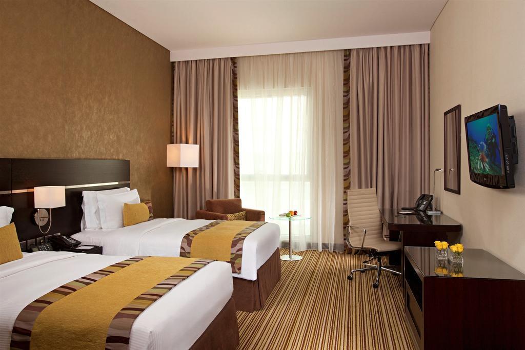 Hotel Hyatt Regency Oryx Ad Dawhah Esterno foto A room at the hotel