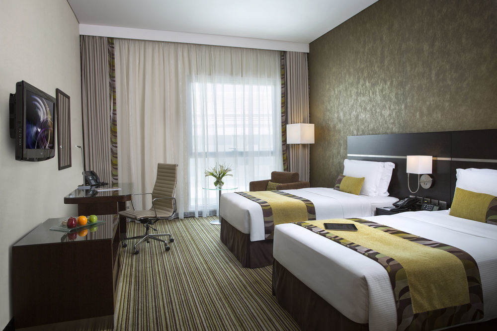 Hotel Hyatt Regency Oryx Ad Dawhah Esterno foto A room at the hotel
